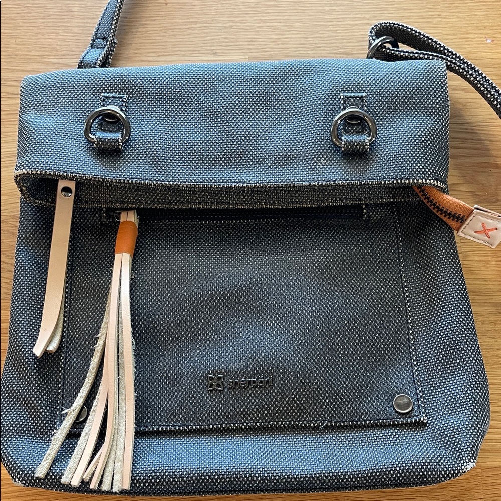 Sherpani Black Crossbody Bag with Tassel